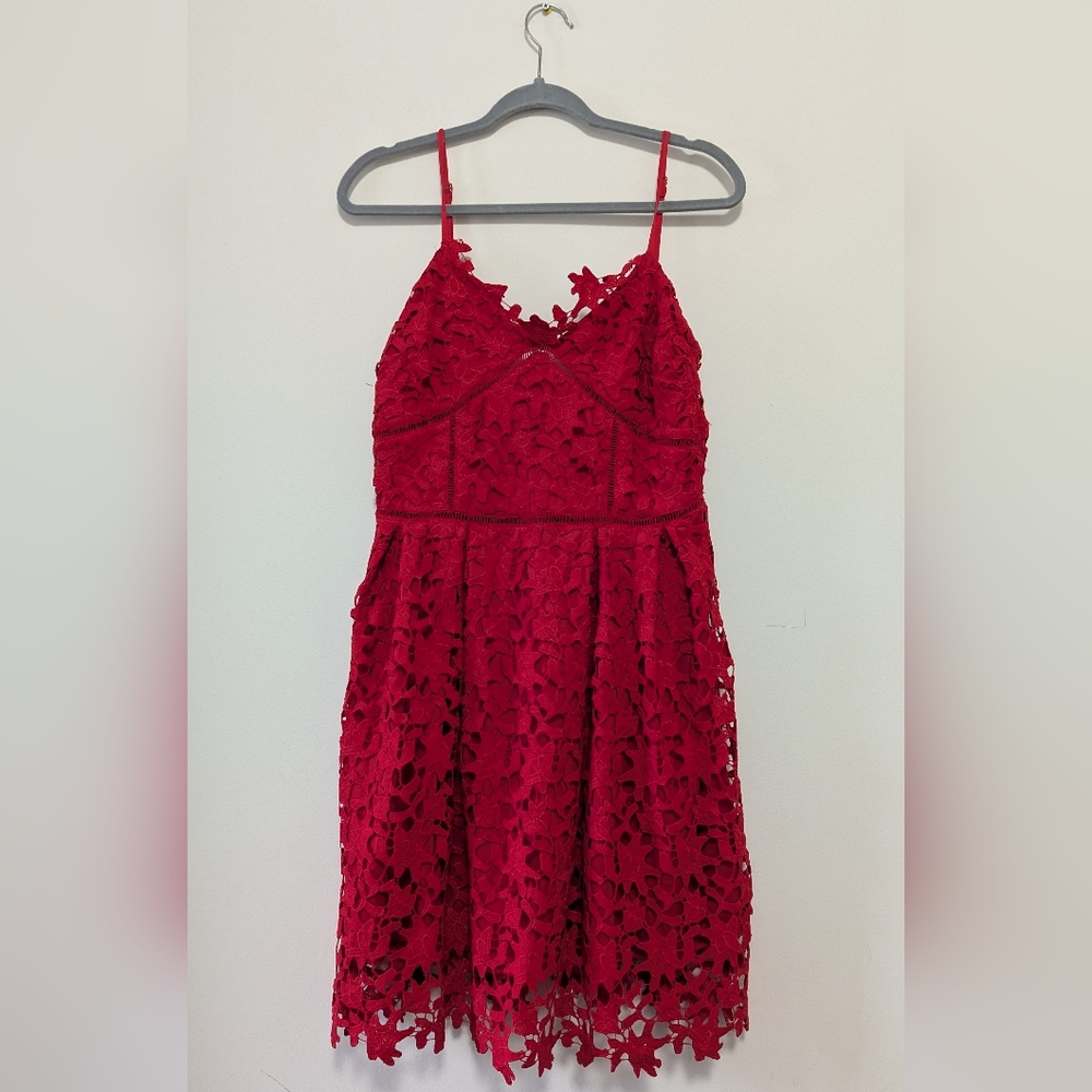 Spaghetti strap red dress. Adjustable straps, fully lined.